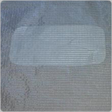 The finished repair. On a large tear like this you should stick a repair patch on both sides.